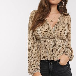 Beige top with black spots